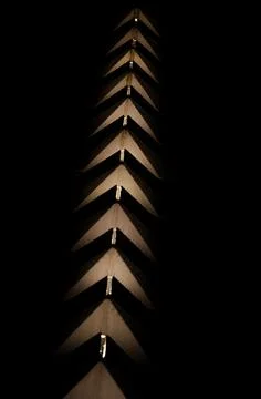 Black background with abstract brown triangles 스톡 사진