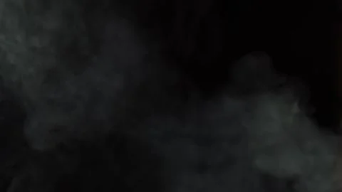 Black background and smoke. Lots of cigarette smoke Stock Footage 237480432