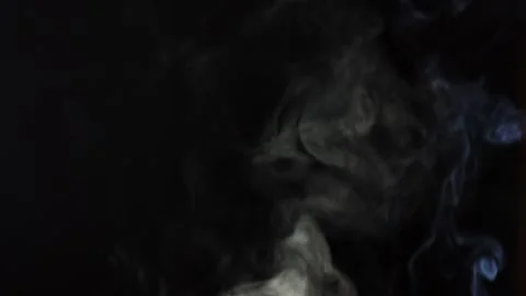 Black background and smoke. Lots of cigarette smoke Stock Footage 237480443