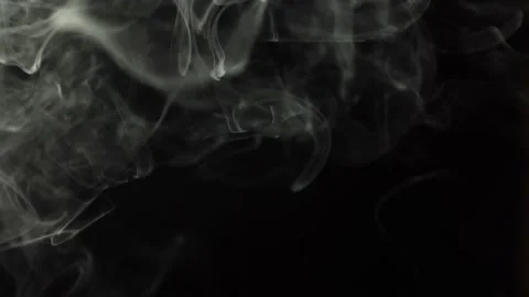 Black background and smoke. Lots of cigarette smoke Stock Footage 237480468