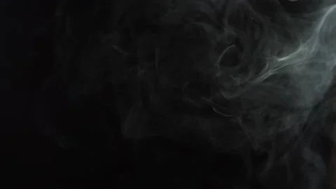 Black background and smoke. Lots of cigarette smoke Stock Footage 237480475