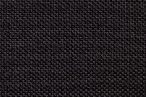 Black background with braided checkered pattern, closeup. Texture of the weav Stock Photos