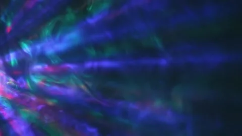 On a black background, colored rays move in clouds of smoke Stock Footage 313145372