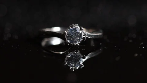 Black background diamond ring shines Stock-Footage 108972141