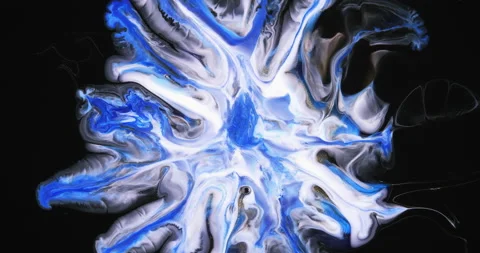 On a black background, a divergent blurring circle of blue, white colors. Ink Stock Footage 235942108