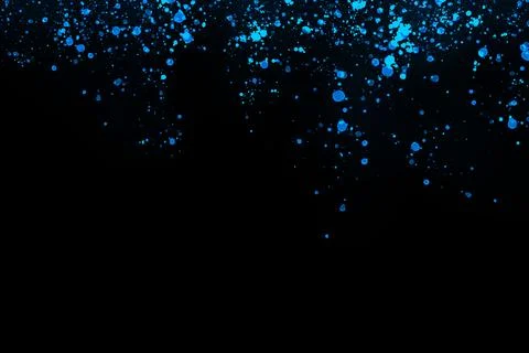 Black background with drops, dots, blots, megumi and dust. Of blue color. 스톡 사진