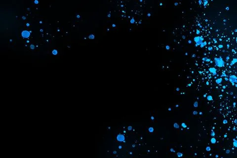Black background with drops, dots, blots, megumi and dust. Of blue color. 스톡 사진