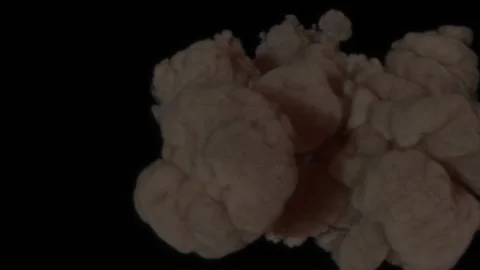 On a black background, a fireball explodes with huge clouds of smoke and Stock Footage 168957891