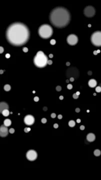 Black background with floating glowing bokeh particles in soft focus and gray Stock Illustration