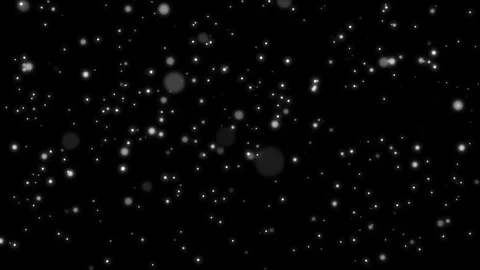 Black background with floating white particles resembling snowflakes. The scene Stock Footage 319963650