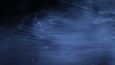 Black background with flowing blue fluid, graphical effect Stock Footage 117102446
