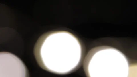 Black background, golden lights, slow motion to the left Vídeos de archivo 317482283