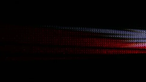 On a black background, the rapid movement of curly multicolored rays of light Stock Footage 101850588