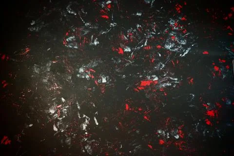 Black background with red, white, gray and blue strokes, dashes, stains and Foto stock