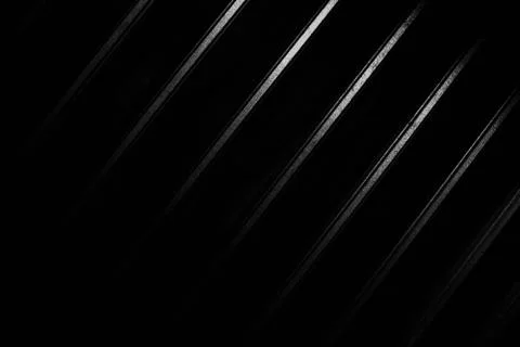 .Black background with reflective strips, multi-line shadows, beautiful shado Stock Photos