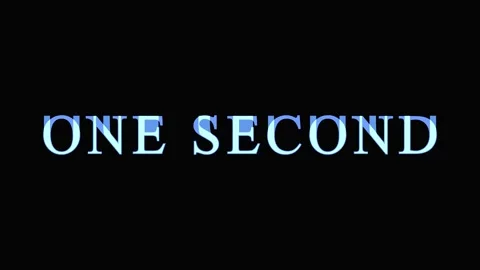 Black background with repeating 'ONE SECOND' text creating a sense of time .. Stock Footage 344035442