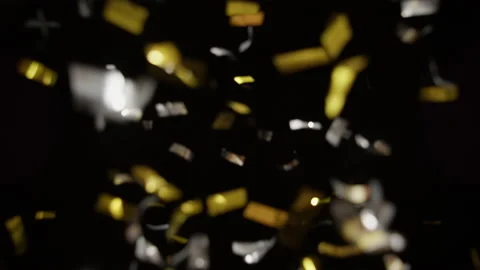 Black Background With Shiny Silver And Gold Confetti Stock Footage 233460727