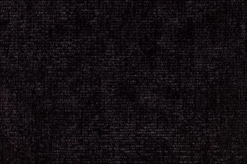 Black background from soft textile material. Fabric with natural texture Stock Photos