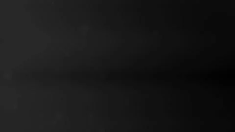 Black background with some white specks Stock Footage 312100982
