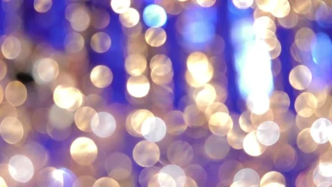 Black background, spherical light video, golden and blue colored bokeh Vidéo 318153409