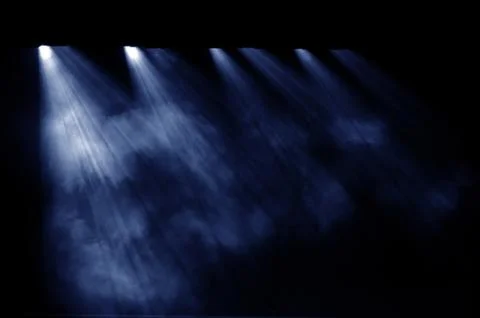 Black background, the spotlight. Stock Photos