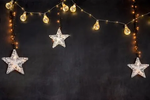 Black background with stars and lights for letters. Stock Photos