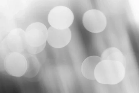 Black background  white bokeh. Stock Illustration