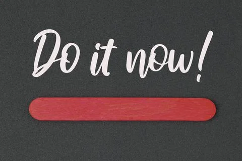 Black background written with DO IT NOW! Stock Photos
