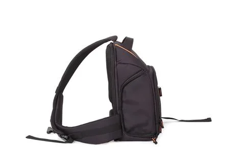 Black backpack bag with multiple zippers and straps Stock Photos