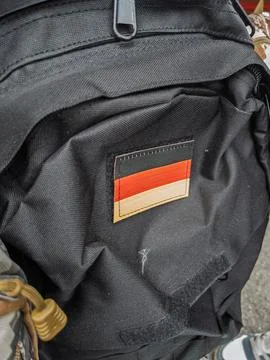 Black Backpack with German Flag Patch Detail Stock Photos