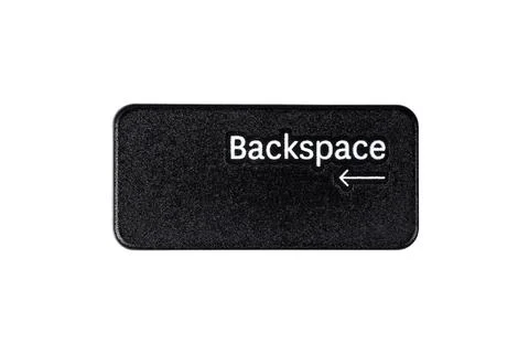 Black backspace button on white background close up Stock Photos