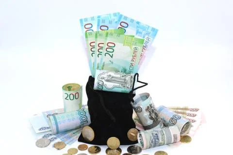 Bag full of money on light background Stock Photo