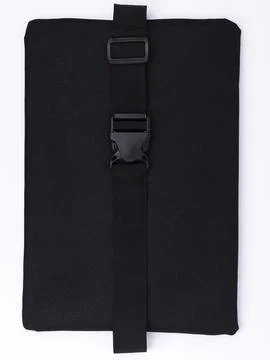 Black bag strap folded flat close up Foto stock