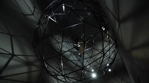 Black ball on the ceiling. Abstraction. Stock Footage 62063942