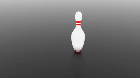 A black ball rolls out of the corner of the dark screen and knocks down a white Stock Footage 128915834