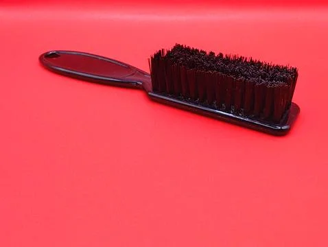 A black barber brush is lying down Stock Photos