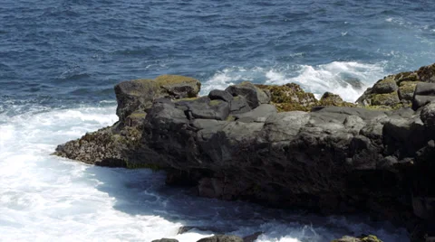 Black basalt Rocks with surf Stock Footage 32153804