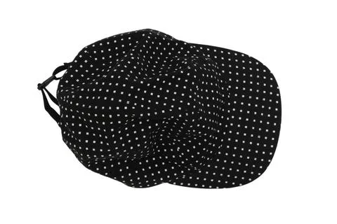 Black baseball cap with white dot pattern. Stylish accessory for casual clo.. Stock Photos