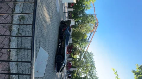 Black Batman's car in the Six Flags Great Adventure park. Vertical video Stock Footage 250199966