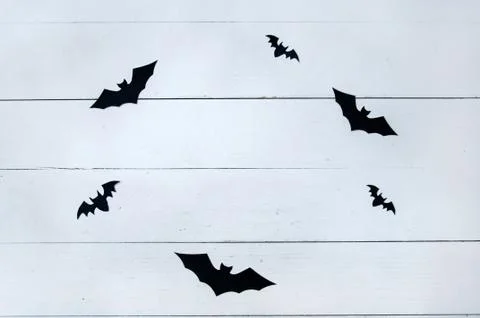Black bats on white background Stock Photos
