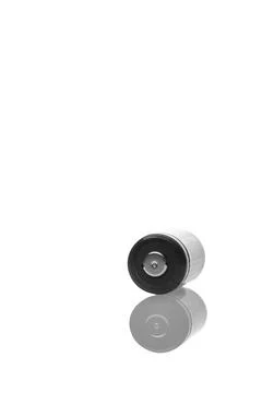 Black battery on a white background, reflection of the battery Stock Photos