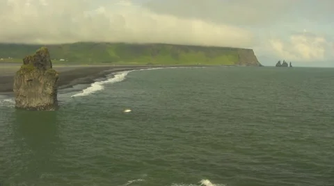 Black beach with Rocks in Vik Iceland high shot sunny Video stock 47765239