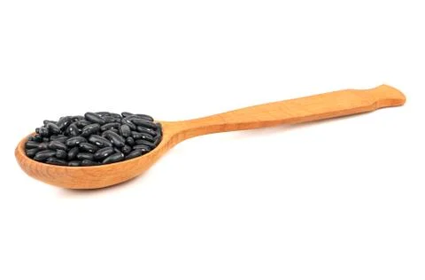 Black beans in spoon Stock Photos
