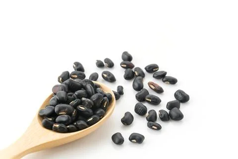 Black beans on white background Stock Photos