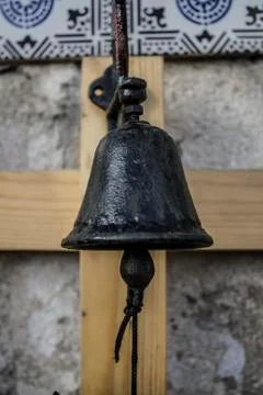 Black bell in the foreground Stock Photos
