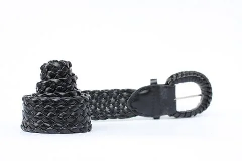 Black belt with reflection on a white background Stock Photos