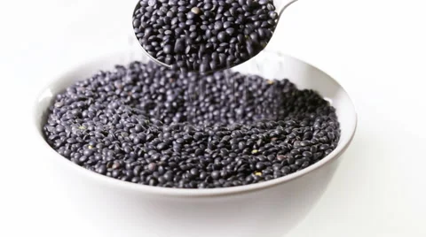Black beluga lentils Stock Footage 62022759