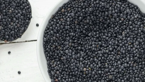Black beluga lentils Stock Footage 76325596