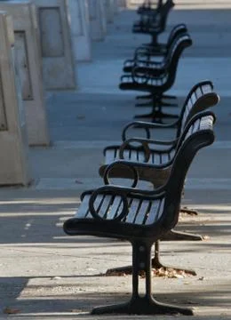 Black bench row Stock Photos