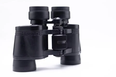 Black Binoculars on White Background, Optical Instrument for Observation an.. Stock Photos
